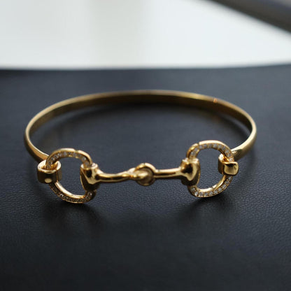 18 ct gold vermeil horsebit bracelet with diamonds with black base